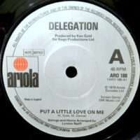 7 / DELEGATION / PUT A LITTLE LOVE ON ME